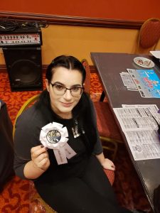 Soonercon 28 miniature painting winner Alexandra Manderfeld poses with her ribbon.